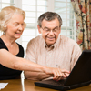 Senior Couple with Laptop